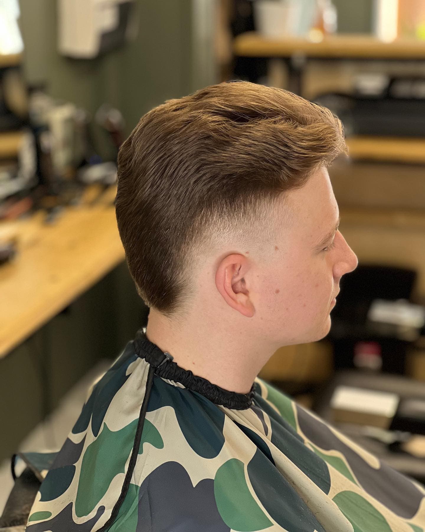 Person from the side with a hair cut